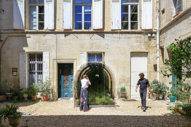 The hotel's lobby showcasing unique design elements and custom lighting, enhancing its artistic ambiance.
