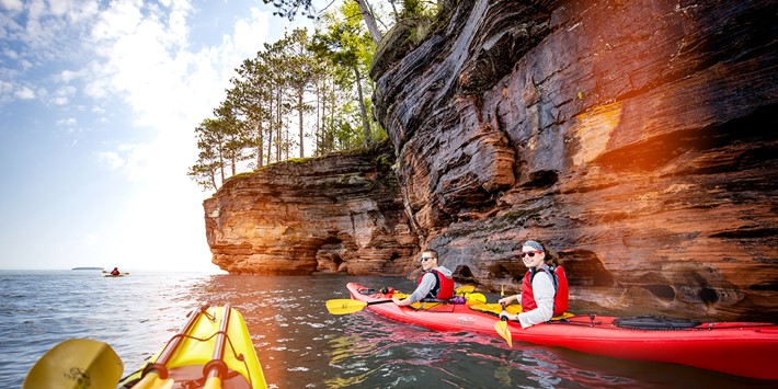 Kayaking along sea caves at Apostle Islands in Bayfield