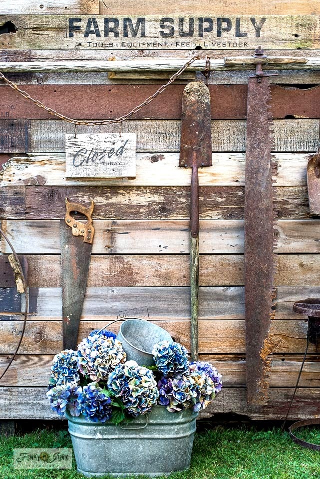 colorful flower display old fence planter
