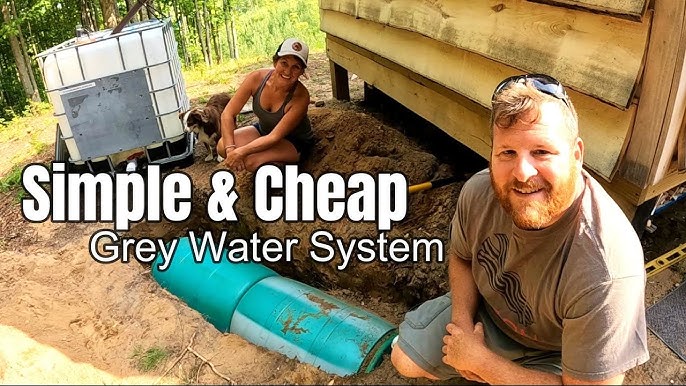 Image: Laying the PVC pipe from the shower to the garden.