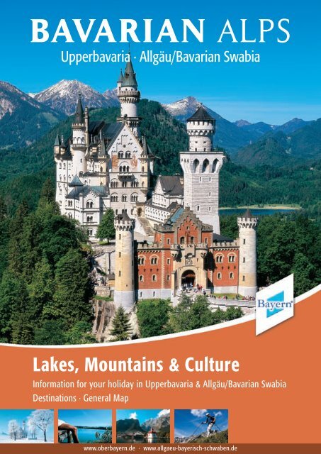 An orchestra performs outdoors with snow-capped mountains in the background.