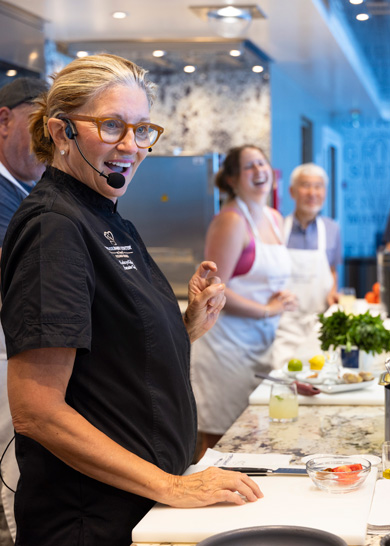 A vibrant Mediterranean market scene filled with fresh produce, herbs, and local delicacies.