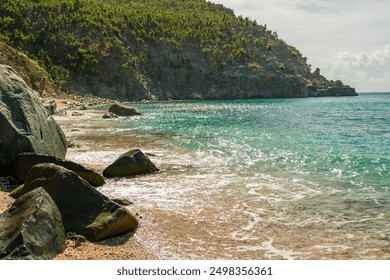 Shell Beach in St. Barthélemy, showcasing the abundance of shells covering the shoreline.