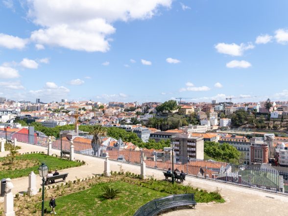 A Group of Tourists on a Free Walking Tour in the Alfama District of Lisbon