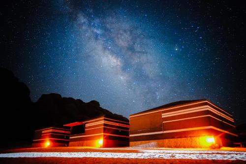 Babak Tafreshi in the Atacama Desert with an elder pointing to the sky