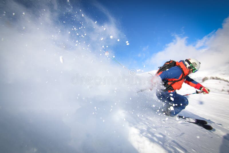 Speed riders soaring through the air with skis skimming the snow in the French Alps. The sunny skies and stunning alpine scenery highlight the exhilarating nature of the sport.