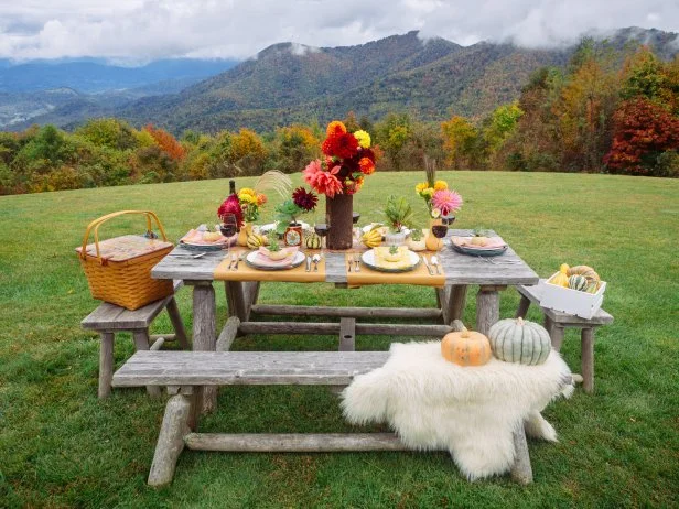 Fall tablescape with foraged centerpiece and candles