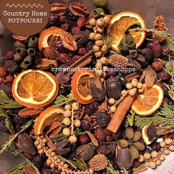 Various spices and apple pieces arranged on a wooden surface