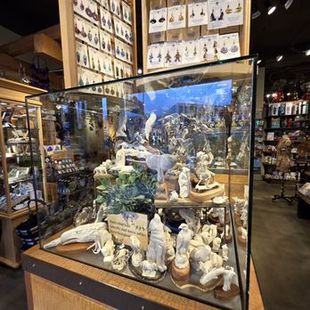 A mobile phone displaying a social media ad for a local restaurant, showcasing a delicious meal and highlighting a special offer.