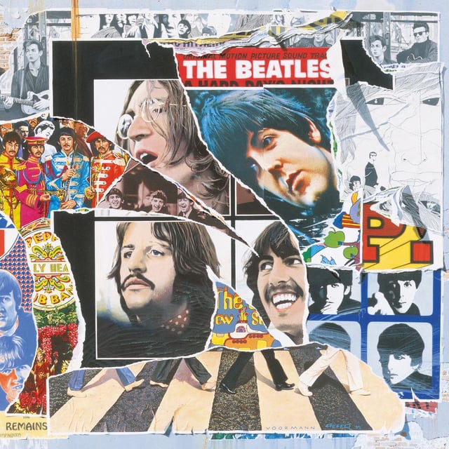 Album cover for the Hey Jude album, with the Beatles leaning out a window on the cover, which is somber and reflective.
