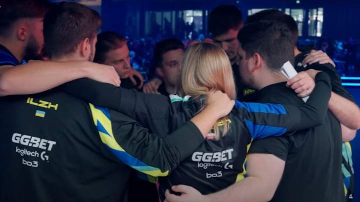 A group of diverse CS2 players strategizing before a match, showcasing the importance of teamwork in esports.