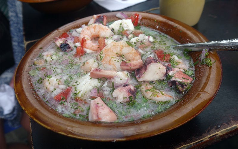 A black lava field meets the turquoise sea in the Galapagos Islands.
