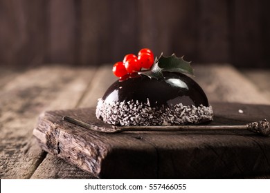 Collage of diverse Yule Log creations shared on social media, showcasing the hashtag #BetterHomesYuleLog.