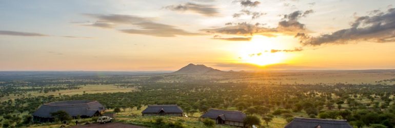 Singita Sasakwa Lodge exterior, showcasing its Edwardian architecture and setting.