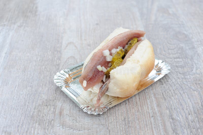 The GVB ferry approaching the Amsterdam Noord harbor with industrial buildings in the background