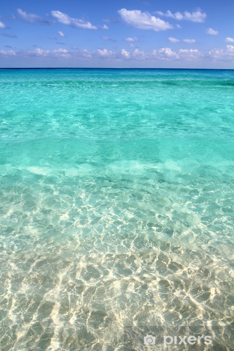 A serene beach with crystal-clear turquoise water and powdery white sand, perfect for a relaxing getaway