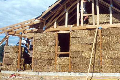 Installing new siding on the insulated wall