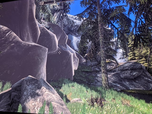 A side-by-side comparison of Whiterun's entrance in vanilla Skyrim versus Skyrim 2020 Remastered. The remastered version boasts sharper textures, enhanced lighting, and more detailed architectural elements.