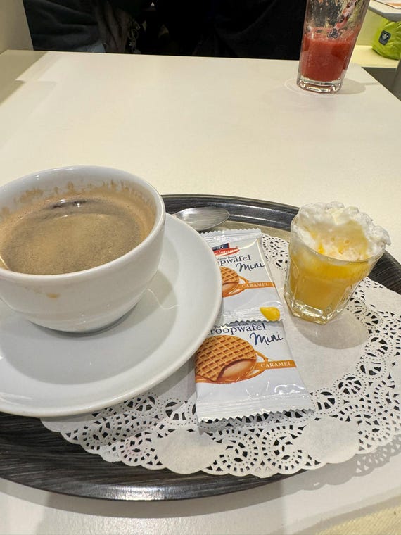 A dorm room with bunk beds and lockers in a hostel.