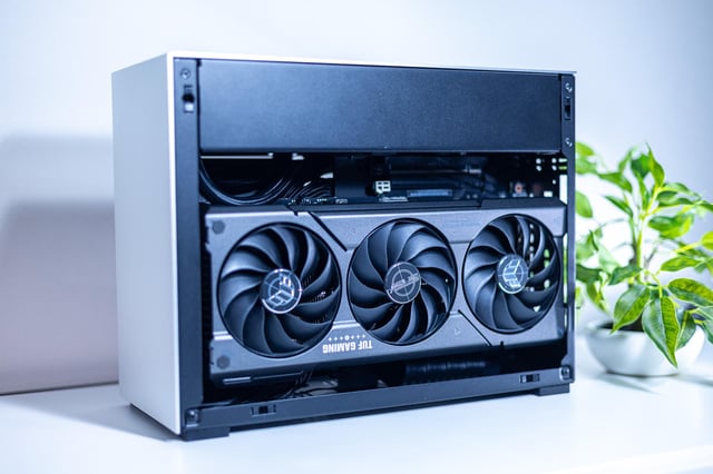 Performance in Games: Screenshots of Alan Wake 2 with ray tracing enabled, taken during a nighttime scene with heavy rain and fog, displaying an FPS counter showing 60+ FPS. Also, a screenshot of Valorant at high refresh rates, displaying an FPS counter showing 300+ FPS. High resolution, minimal UI elements.