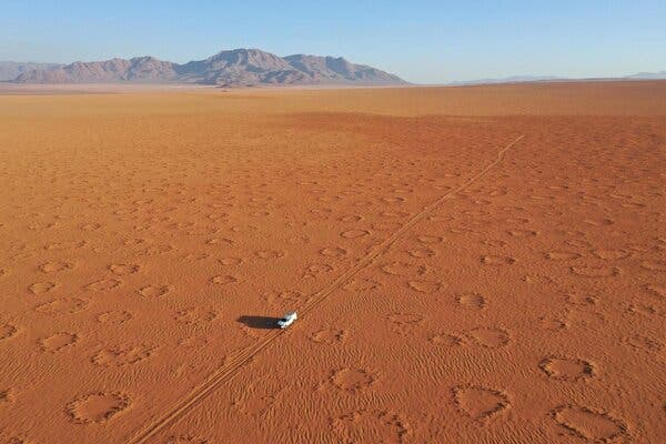 View of &Beyond Sossusvlei Desert Lodge blending into the desert landscape