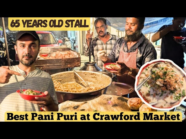 A plate of pav bhaji, showing the mashed vegetable curry and buttered pav bread.