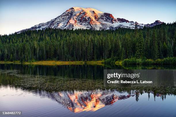 A stunning mountain range under a colorful sky, showcasing the beauty of the landscape.