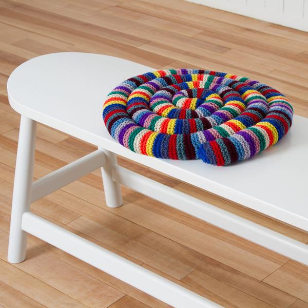 Artisan crafting furniture for the Fogo Island Inn, showcasing traditional woodworking techniques