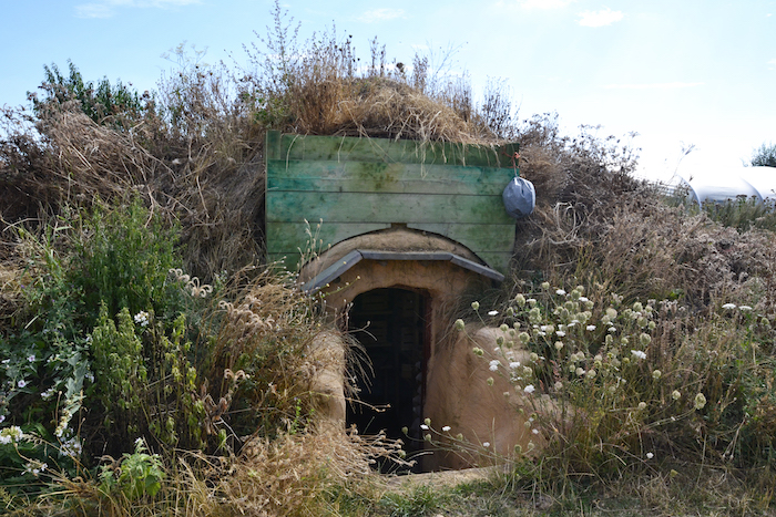 A root cellar on a hill.