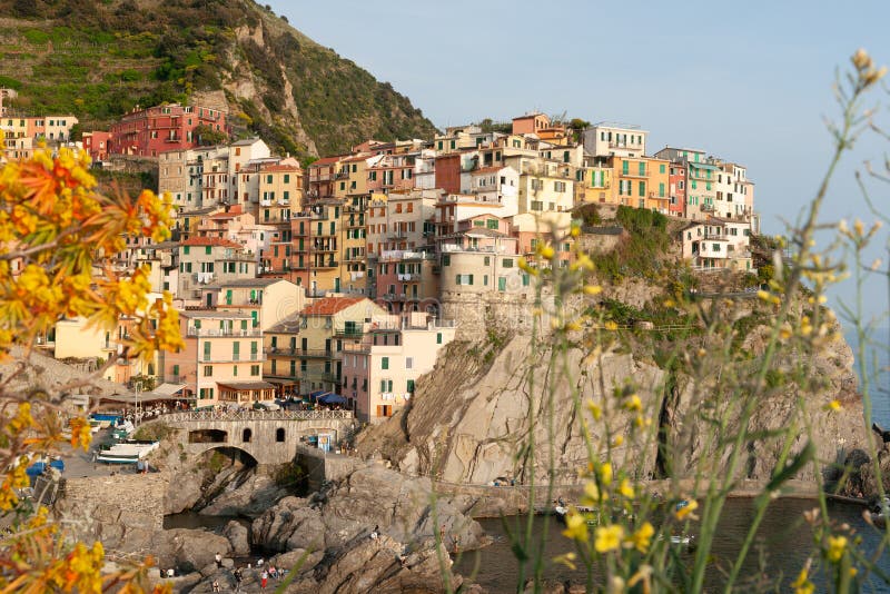 A family participating in a beach cleanup effort in Cannon Beach, Oregon