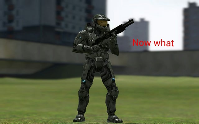 A frustrated Garry's Mod player with their head in their hands, surrounded by glitched props.