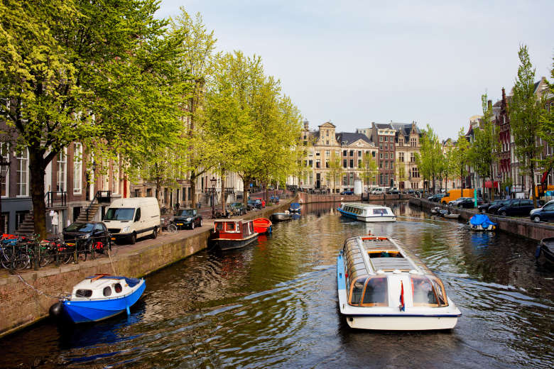 # Amsterdam Canal Dreams: A Luxury Art and History...