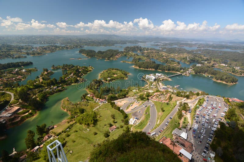 People looking out over the Medellin Skyline at Sunset