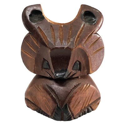 Someone snowboarding through a snow-covered tree run at Rusutsu