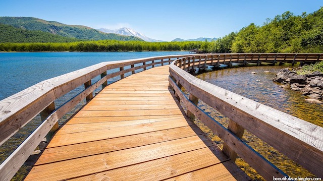 Sunset over Lake McDonald with alpenglow on peaks