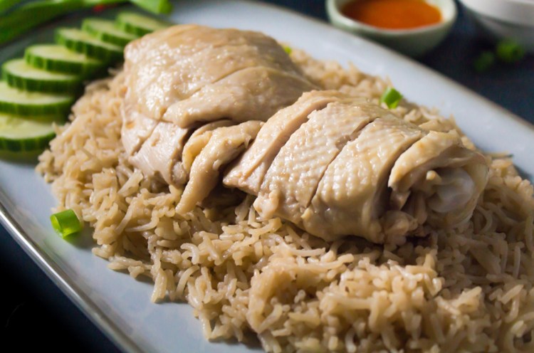 Silky smooth chicken, fragrant rice cooked in chicken broth, and a zesty chili sauce