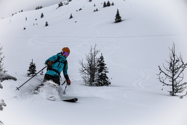 Family ski touring in backcountry near Banff.