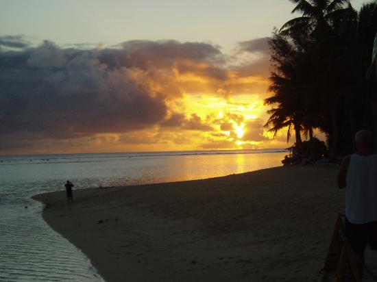 The vibrant colors and atmosphere of the Punanga Nui Market in Rarotonga, captured by a budget traveler's smartphone