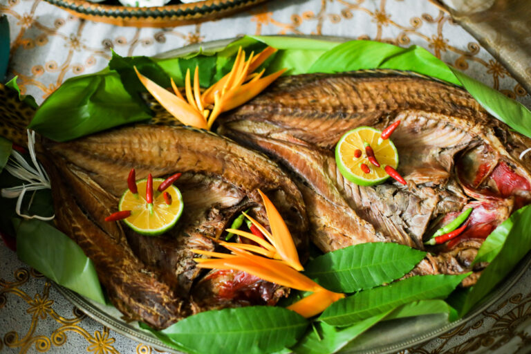 A Palauan conservationist working to protect coral reefs, demonstrating the community-based efforts to combat environmental challenges.