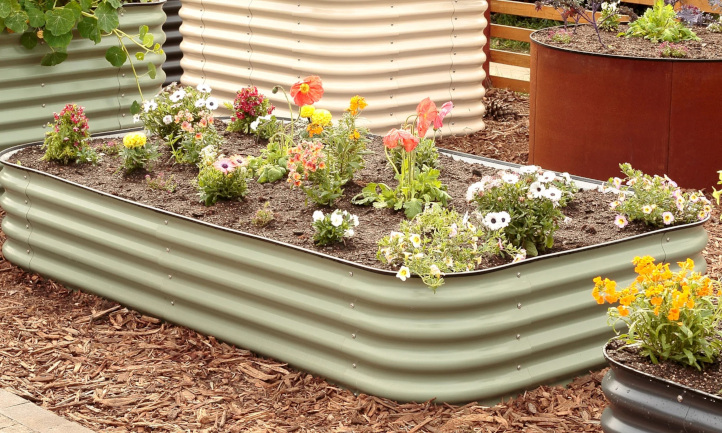 A raised garden bed made of galvanized steel, suitable for accessible gardening.