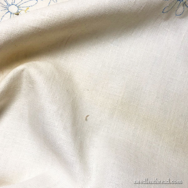 Linen tablecloth showcasing decorative embroidery.