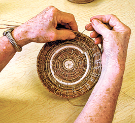 pine needle basket tools arranged artistically