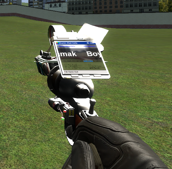 A close-up view of a Garry's Mod player frantically trying to delete rapidly duplicating props with their physics gun. The props are glitching and clipping through each other, creating a visual mess.