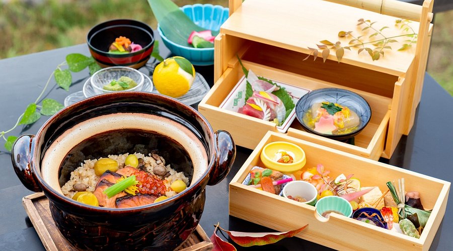 A chef meticulously prepares a wagashi, using specialized tools and techniques.