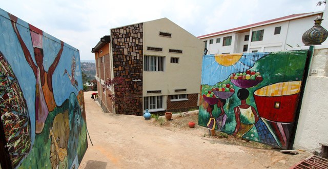 A vibrant display of artwork at Inema Arts Centre in Kigali, featuring colorful paintings and sculptures that showcase the creativity of Rwandan artists.
