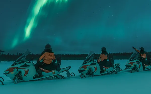 Electric Snowmobile Aurora Hunting