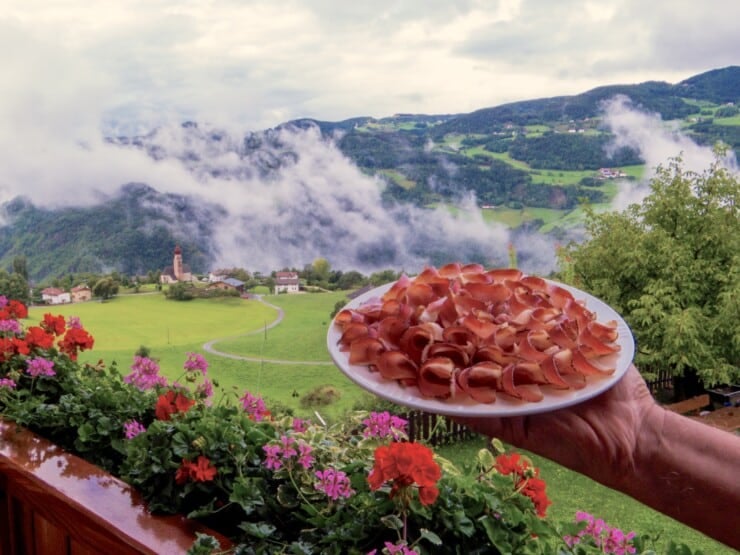 The breathtaking Val di Funes, a haven for culinary explorers.