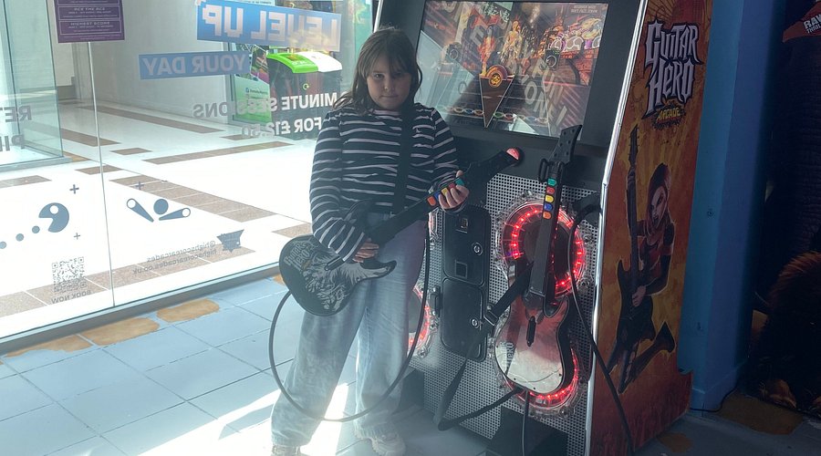 Park Güell at sunrise, with a few people walking around
