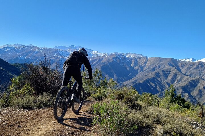 Mountain biker on a scenic trail in the Andes