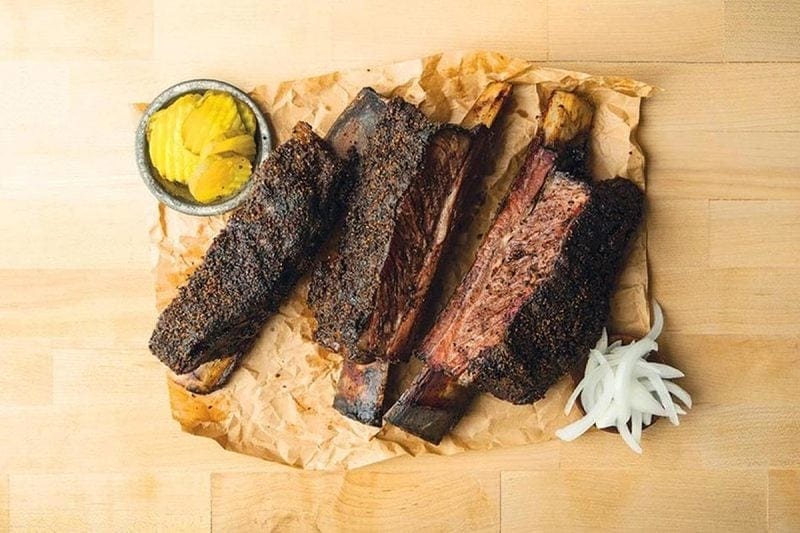 Image of a cast iron skillet with spiced beef ribs